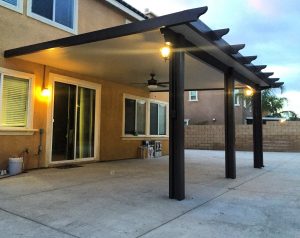 Custom patio cover being shown with custom lighting