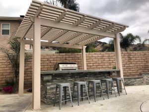 Pergola with bar area and grill
