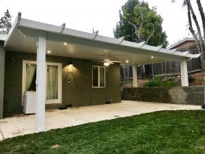 Custom Patio Cover installed with ceiling fan and lights