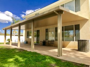 Wide patio cover installed for a two-story home in Lake Elsinore, CA
