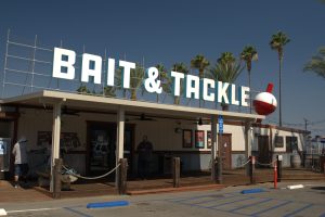 Custom cover for a commercial bait and tackle shop, white with a flat top